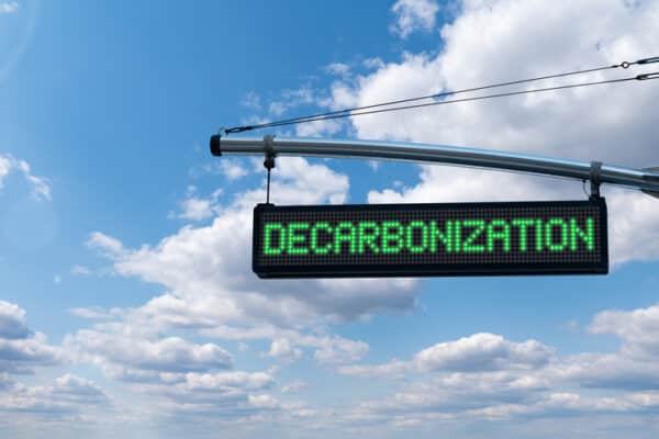 a sign with decarbonization written on it