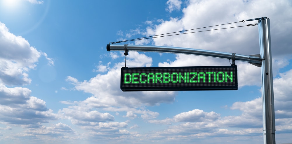 a sign with decarbonization written on it